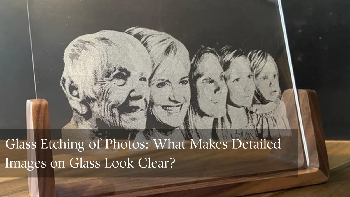 Glass photo etching on a clear glass plaque showing a frosted portrait against a dark background