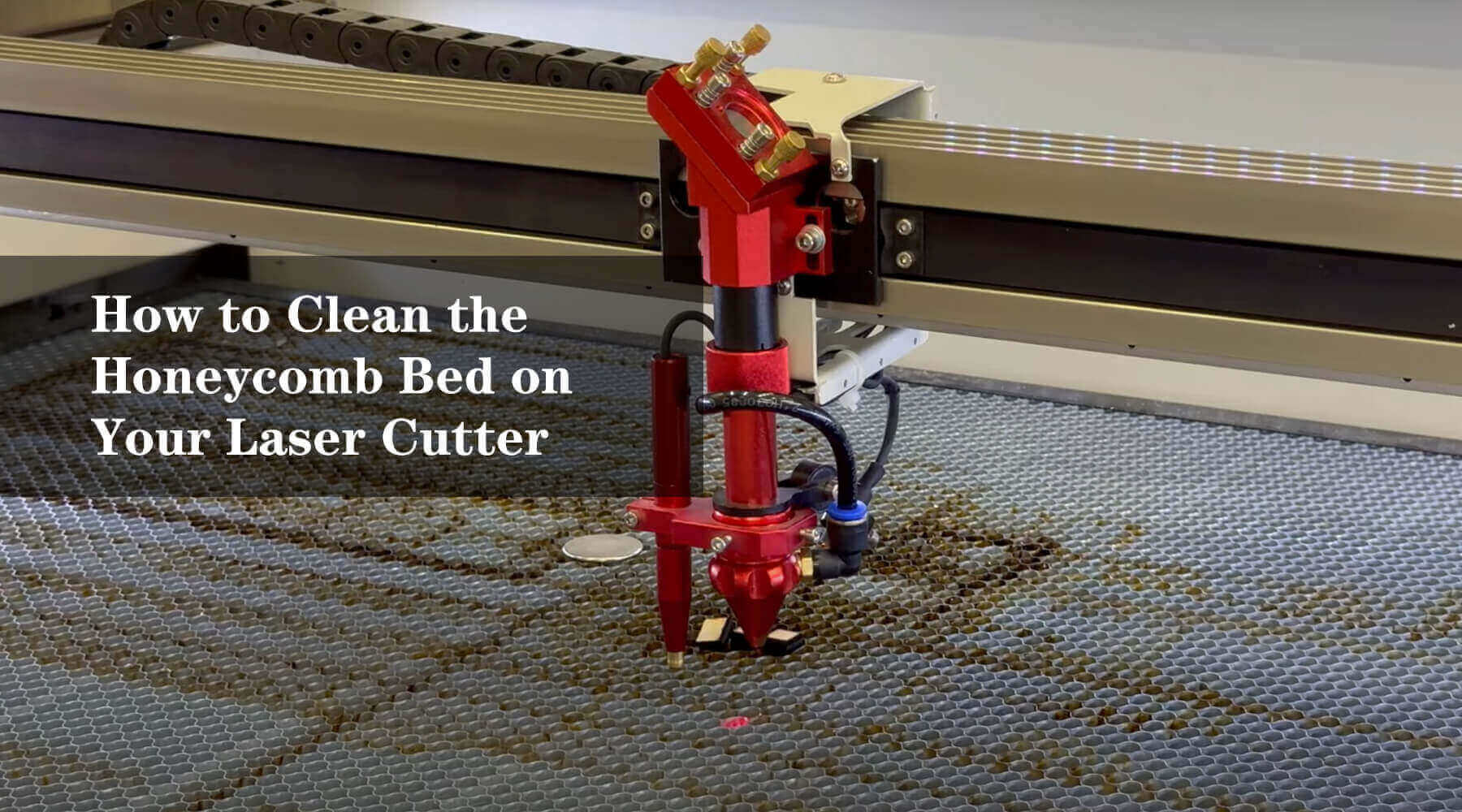 How do you clean the honeycomb bed on your laser?
